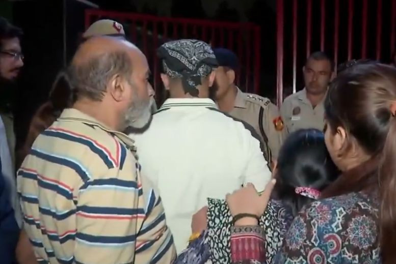 Jatin's father on hunger strike in front of the DCP's office, demanding justice.